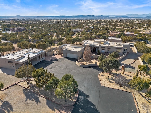 bird's eye view with a mountain view