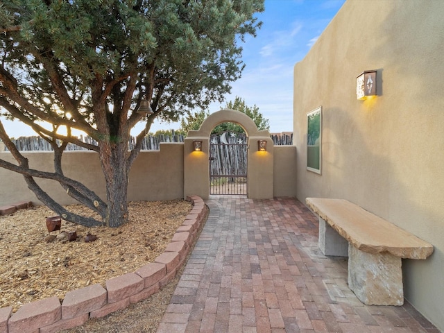 view of gate featuring fence