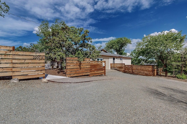 exterior space featuring a fenced front yard