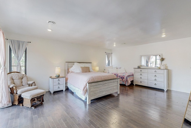 bedroom featuring recessed lighting and dark wood-style floors