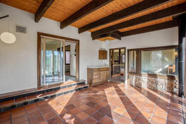 bathroom with tile patterned flooring, beamed ceiling, wood ceiling, and visible vents