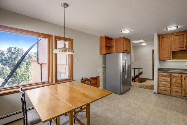 kitchen featuring a baseboard heating unit, light floors, brown cabinets, stainless steel refrigerator with ice dispenser, and open shelves