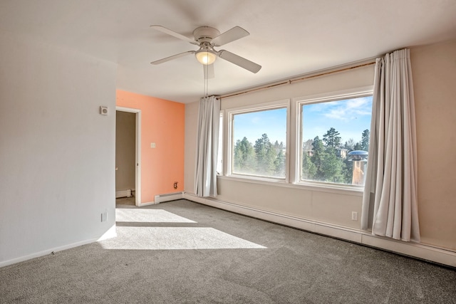 carpeted spare room featuring a baseboard heating unit, a ceiling fan, baseboards, and a baseboard radiator