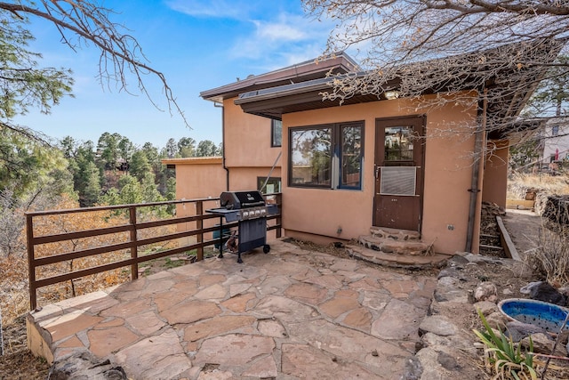 view of patio / terrace featuring area for grilling and entry steps