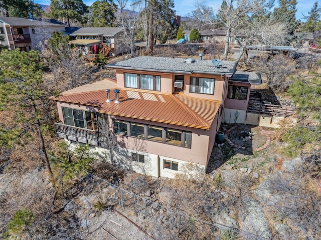 view of front of house featuring stucco siding