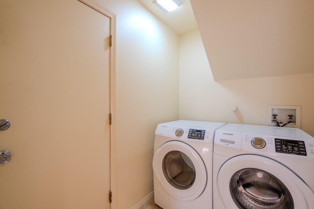 laundry room with laundry area and washing machine and dryer