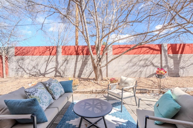 view of patio / terrace featuring a fenced backyard and an outdoor hangout area