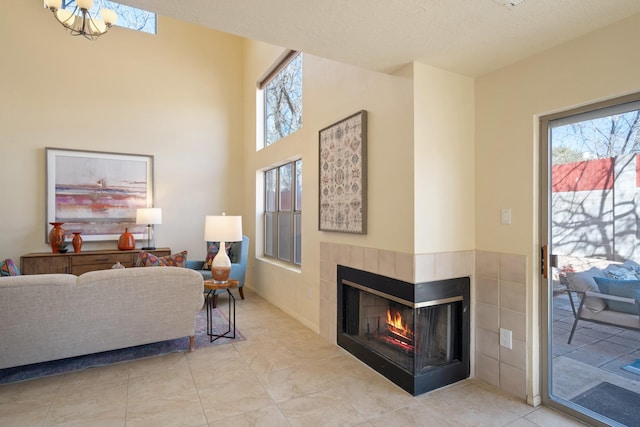 living area with a wealth of natural light and a multi sided fireplace