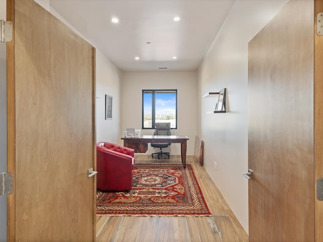 office area featuring recessed lighting, visible vents, and wood finished floors