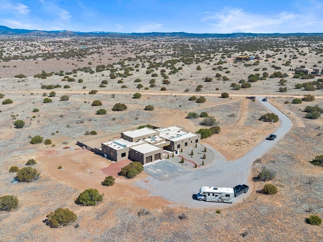 aerial view with view of desert and a mountain view