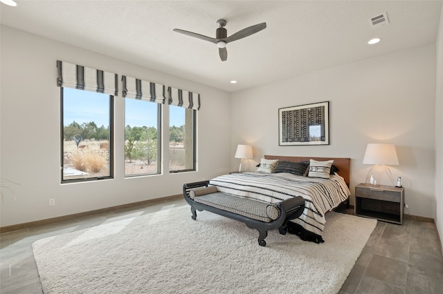 bedroom featuring visible vents, recessed lighting, a ceiling fan, and baseboards