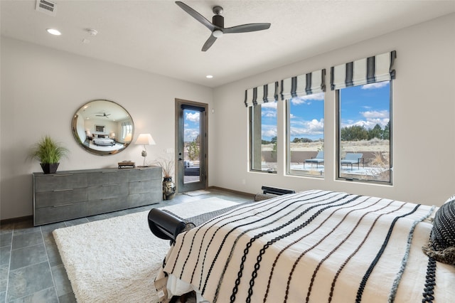 bedroom featuring a ceiling fan, baseboards, visible vents, tile patterned floors, and access to outside