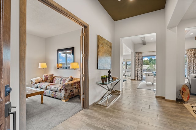 interior space with baseboards and a healthy amount of sunlight