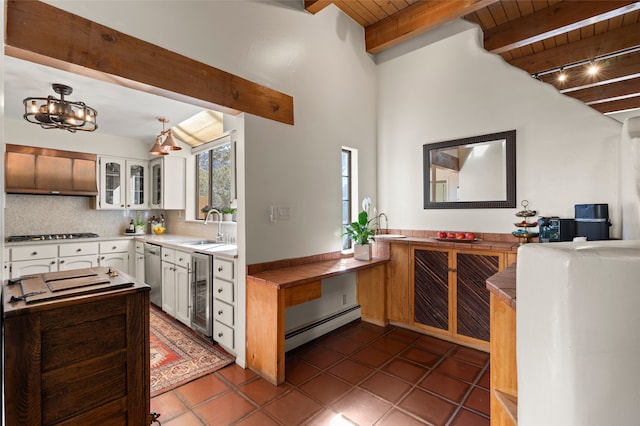 kitchen featuring tasteful backsplash, a baseboard radiator, wooden ceiling, white cabinets, and a sink