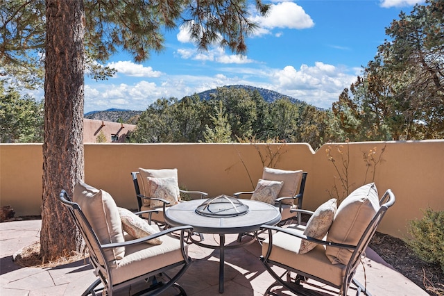 view of patio featuring a mountain view