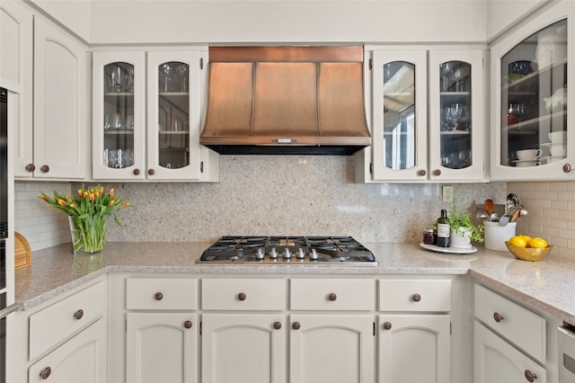 kitchen featuring white cabinets and stainless steel gas cooktop