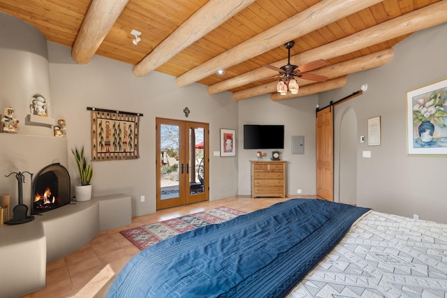 tiled bedroom featuring a barn door, a large fireplace, french doors, wood ceiling, and access to exterior