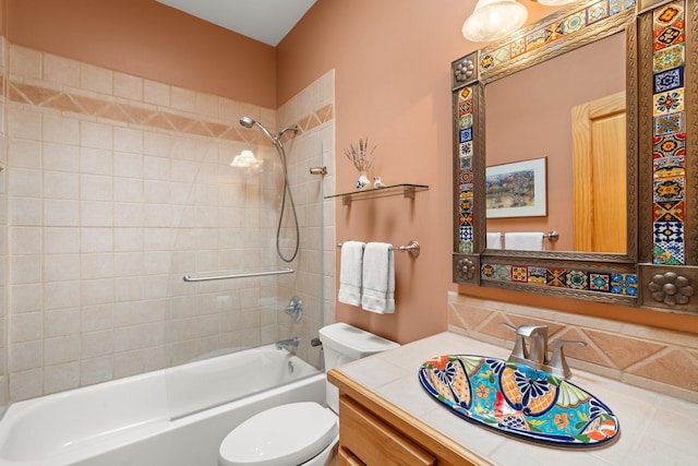 bathroom with vanity, toilet, and tub / shower combination