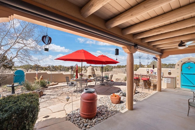 view of patio featuring outdoor dining space and a fenced backyard