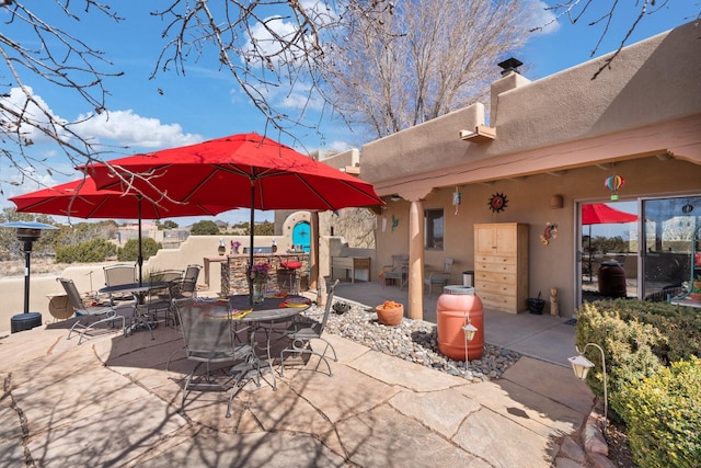 view of patio with outdoor dining space