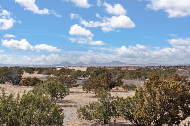 view of mountain feature with a rural view