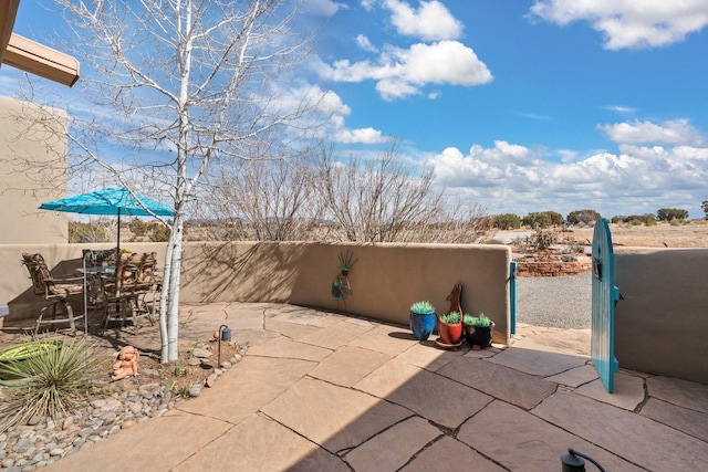 view of patio / terrace with fence