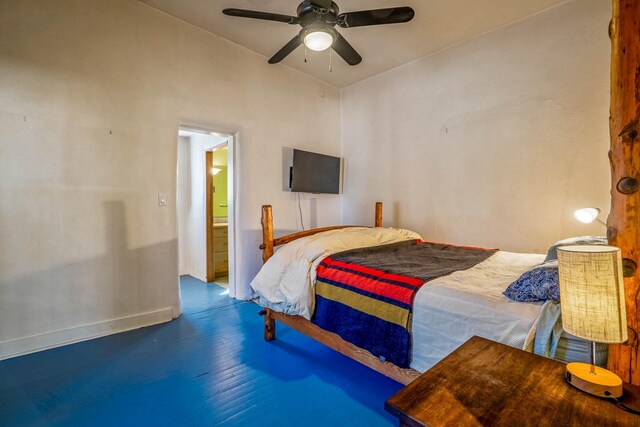 bedroom featuring wood finished floors and ceiling fan