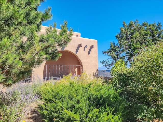 view of home's exterior with stucco siding