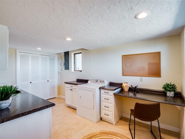 washroom featuring recessed lighting, a textured ceiling, and washer / dryer