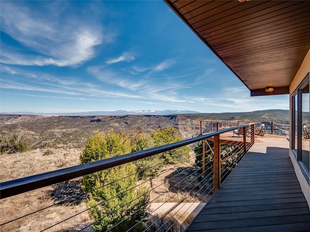 balcony featuring a mountain view