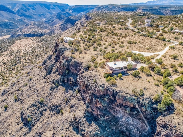 drone / aerial view featuring a mountain view