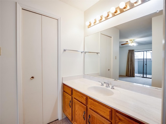 bathroom with vanity and a ceiling fan