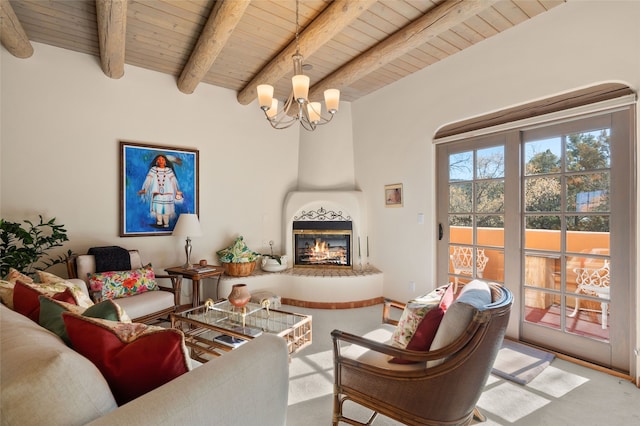 living area featuring a large fireplace, carpet floors, wood ceiling, and a chandelier