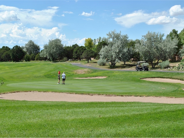 3101 Old Pecos Trl Unit 219, Santa Fe, NM 87505 - view of home's community with golf course view and a yard
