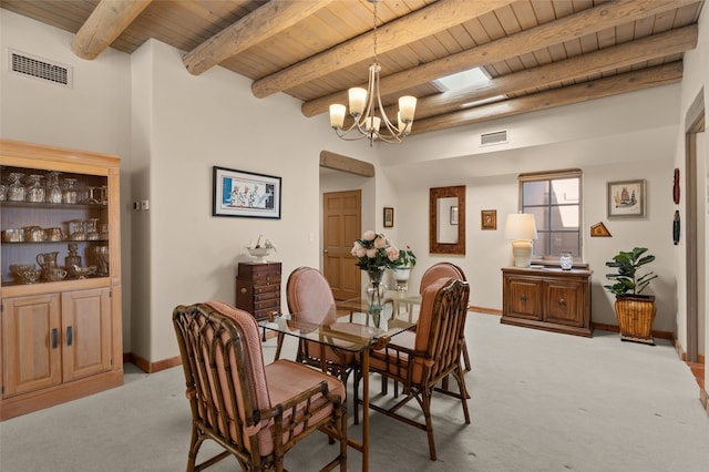 3101 Old Pecos Trl Unit 219, Santa Fe, NM 87505 - dining space with visible vents, a notable chandelier, light colored carpet, and wood ceiling