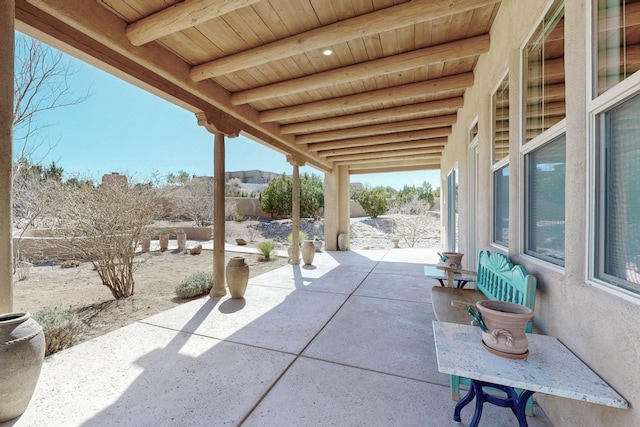 view of patio featuring fence