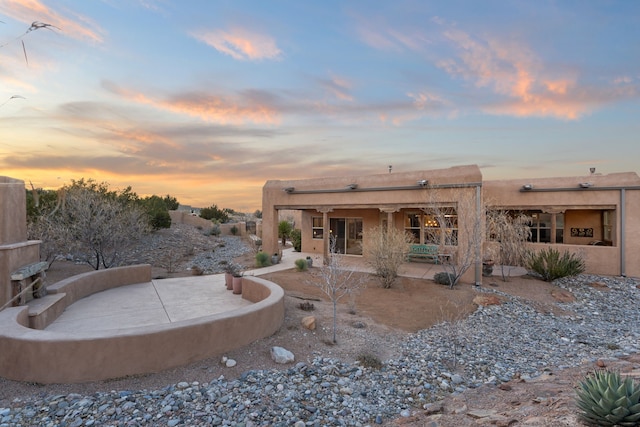 rear view of property with a patio area