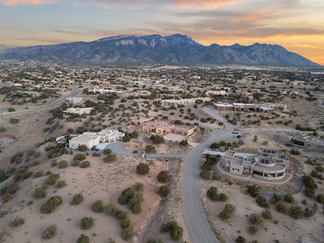 bird's eye view with view of desert and a mountain view