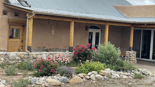 entrance to property with metal roof