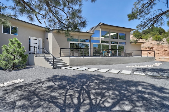 exterior space with stucco siding