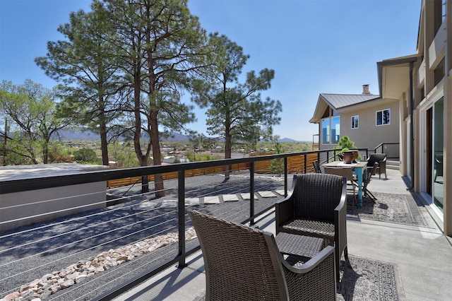 view of wooden balcony with a wooden deck