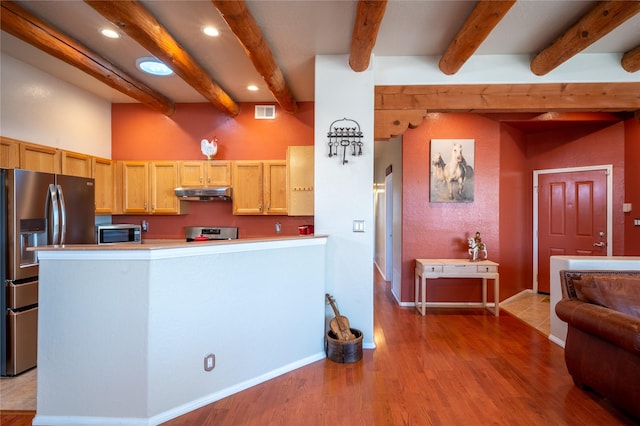 kitchen featuring visible vents, recessed lighting, under cabinet range hood, appliances with stainless steel finishes, and light wood-type flooring