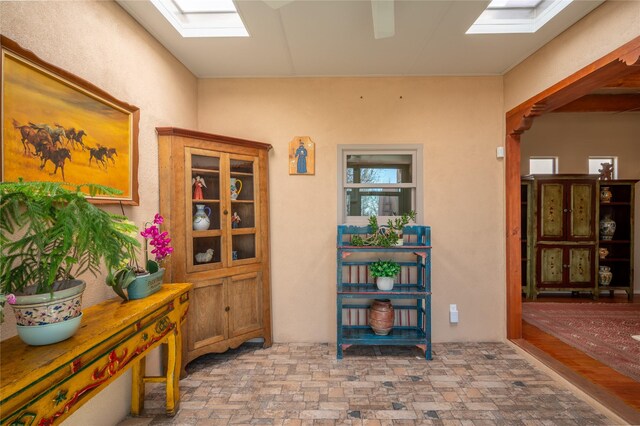 interior space featuring a skylight