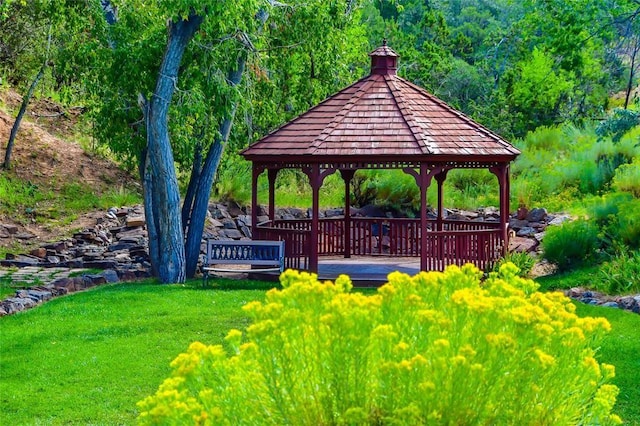 view of home's community featuring a gazebo and a lawn