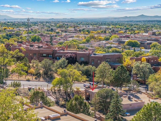 birds eye view of property featuring a mountain view