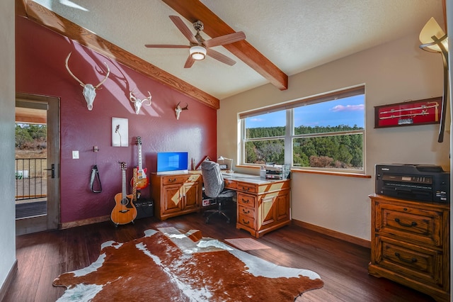 office featuring lofted ceiling with beams, a ceiling fan, dark wood-style flooring, and a textured ceiling