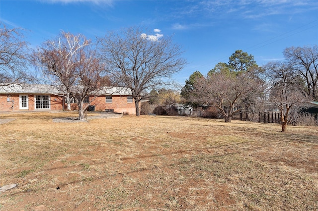 view of yard with fence