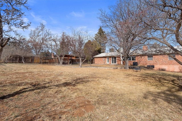 view of yard featuring fence