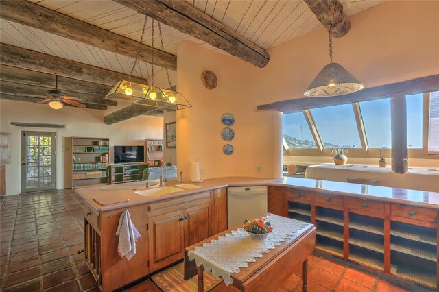 kitchen featuring beamed ceiling, wood ceiling, white dishwasher, and a sink