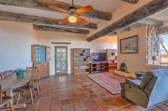 tiled living room with wooden ceiling, beamed ceiling, a ceiling fan, and visible vents